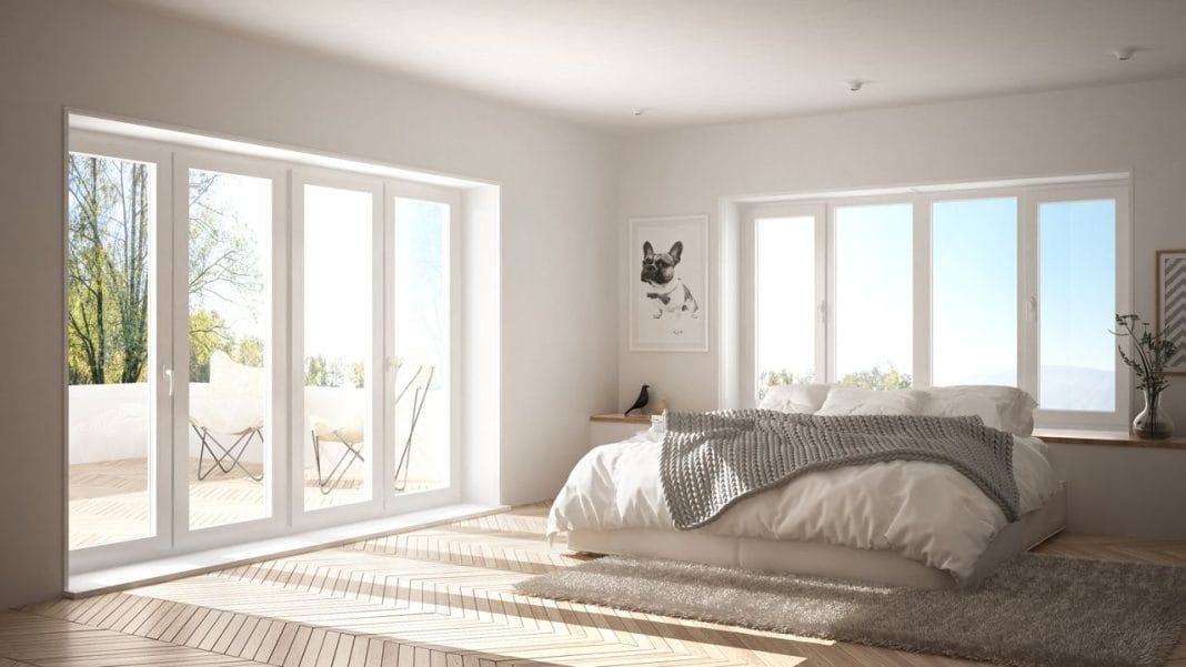 Scandinavian white minimalist bedroom with panoramic window, fur carpet and herringbone parquet, modern architecture interior design décoration chambre minimaliste